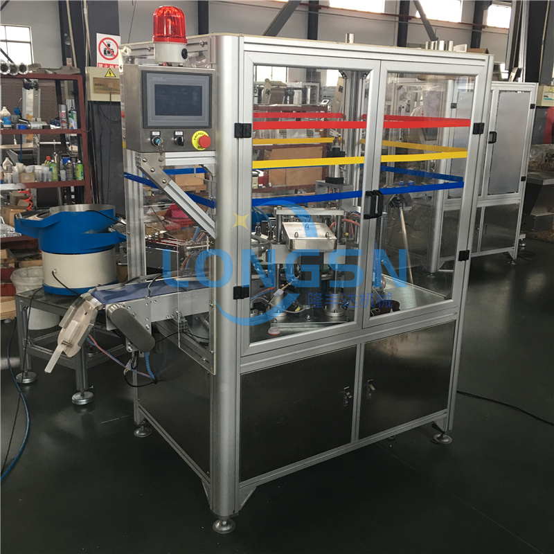 M&aacute;y lắp r&aacute;p nắp